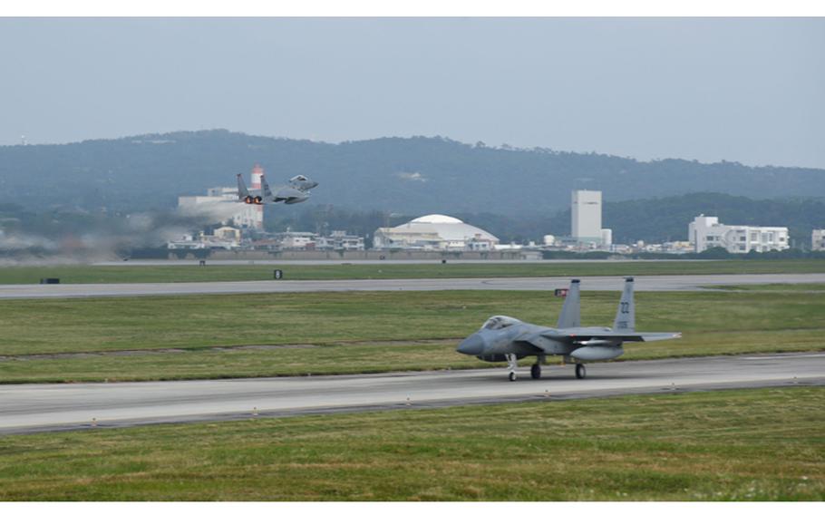 U.S. Air Force F-15C Eagles takeoff from the runway and taxi along the flightline during Exercise WestPac Rumrunner Oct. 16, 2020, at Kadena Air Base, Japan. (U.S. Air Force photo by Tech. Sgt. Benjamin Sutton)