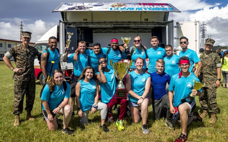 U.S. Marines with Combat Logistics Regiment 3, 3rd Marine Logistics Group, pose for a photo at Camp Foster, Okinawa, Japan, Sept. 27, 2019. The Marines placed first in the inaugural Ultimate Battle and Fear Factor Challenge, hosted by the Single Marine Program to uplift unit morale and promote unit cohesion. (U.S. Marine Corps photo by Cpl. Savannah Mesimer)