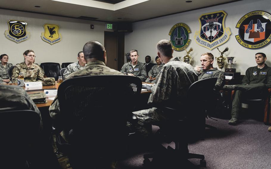 U.S. Air Force Lt. Gen. Kevin Schneider, U.S. Forces Japan and Fifth Air Force commander, and Brig. Gen. Case Cunningham, 18th Wing Commander, listen to mission briefings from the 18th Civil Engineer Group and 18th Mission Support Group April 4, 2019, at Kadena Air Base, Japan. Schneider met with commanders from the 18th CEG and 18th MSG to assess the living conditions and support for service members and their families. (U.S. Air Force photo by Staff Sgt. Omari Bernard)