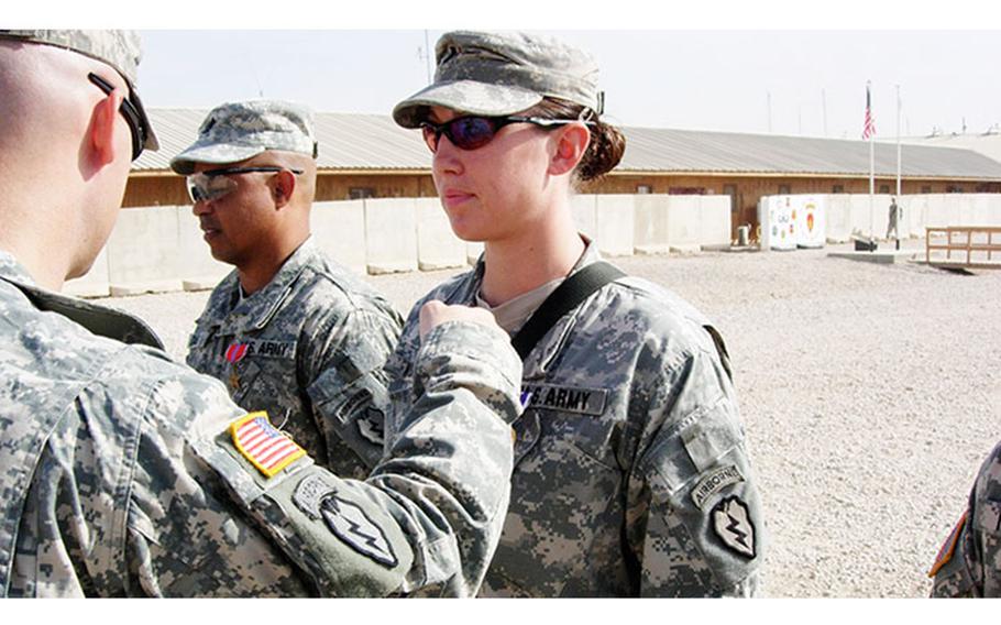 Stephanie Ehlers is awarded a Purple Heart on April 8, 2007 for injuries sustained in Iraq. She had bilateral perforations of the eardrums and a TBI. (Photo Courtesy of Stephanie Ehlers)