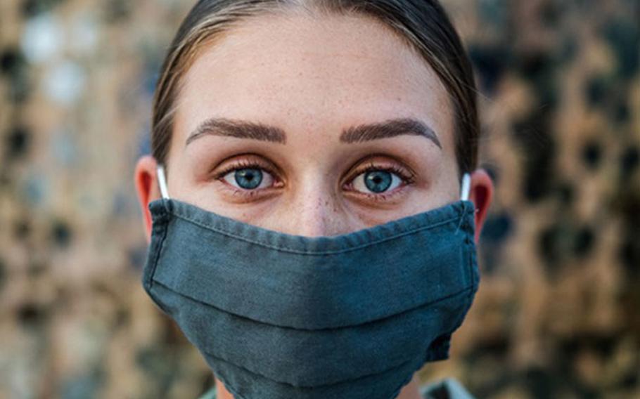 Air Force Senior Airman Olivia Grooms, a 379th Air Expeditionary Wing broadcast journalist, poses for a portrait at Al Udeid Air Base in Qatar. (U.S. Air Force photo by Staff Sgt. Lauren Parsons)