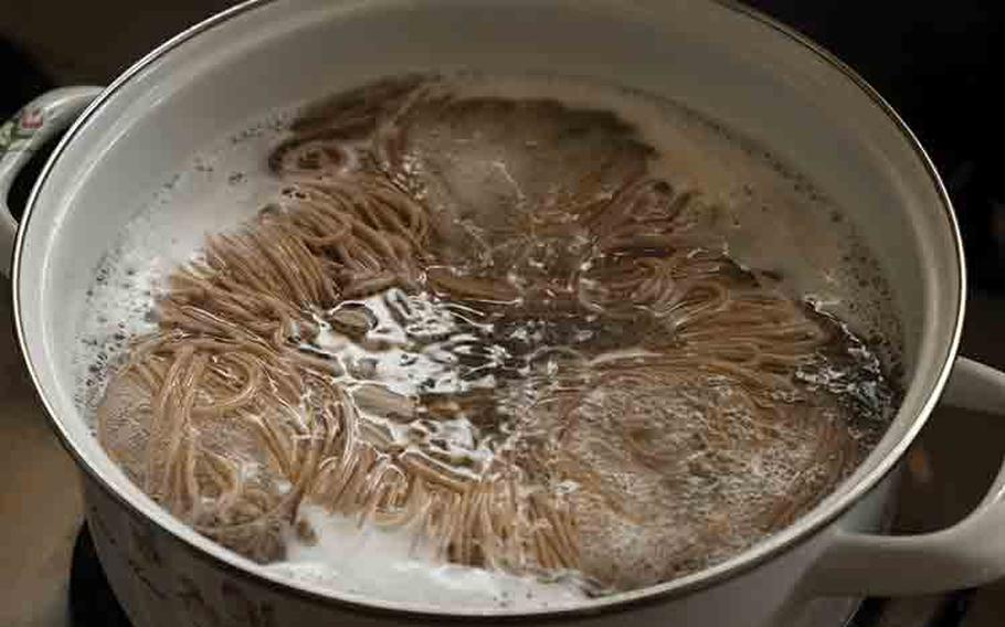 In a separate pot, bring water to a boil. Add the soba noodles and let it simmer until the noodles are cooked through (about 1-2 minutes for raw noodles, and 3-4 minutes for dried noodles/see note below). Then, turn off the heat and strain out the water.