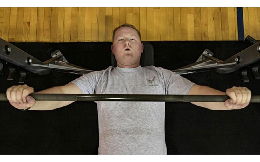 Air Force Senior Airman James Fritz, 911th Airlift Wing public affairs specialist, performs a barbell bench press in the gym at the Pittsburgh International Airport Air Reserve Station, on Jan. 25. Heart health experts recommend doing three sets of 12 repetitions each, increasing the weight in each set and taking 1 minute to rest between sets (Photo by: Joshua Seybert, 911th Airlift Wing).