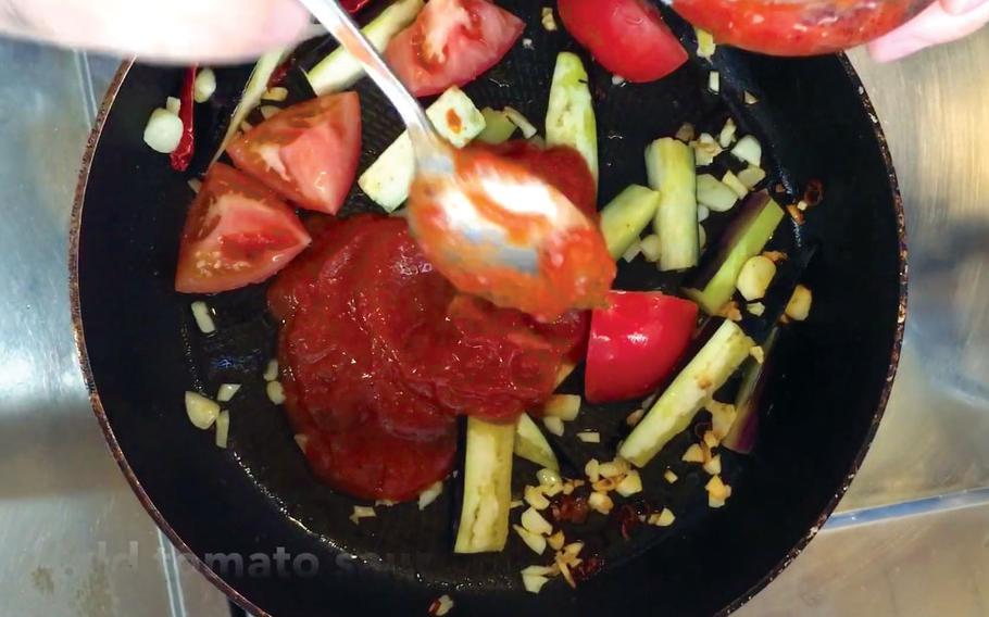 Add the tomato sauce to the pan.