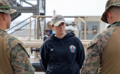 Photo Of Chief Warrant Officer 2 Amanda F. Hurley, the vessel master of the U.S. Army boat LCU 2032 Palo Alto meets with her Marine counterparts before a joint training exercise between the U.S. Army’s 5th Transportation Company, part of the 765th Transportation (Terminal) Battalion and the U.S. Marines’ Battalion Landing Team 2/4, 31st Marine Expeditionary Unit.