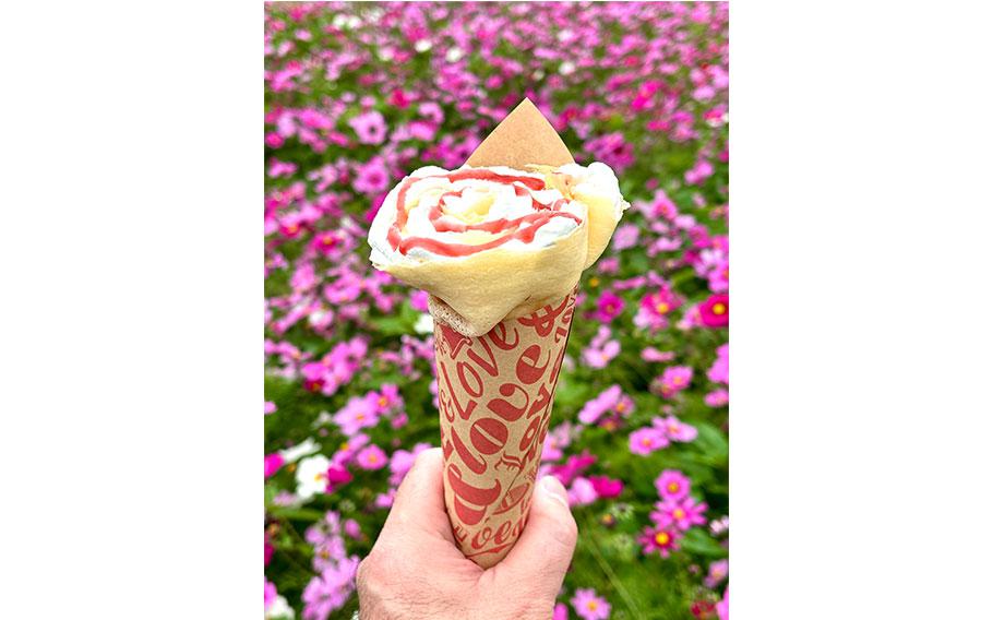 a raspberry crepe on Shoji’s hand.