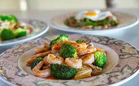 Photo Of Stir-fried shrimp and broccoli sprouts.