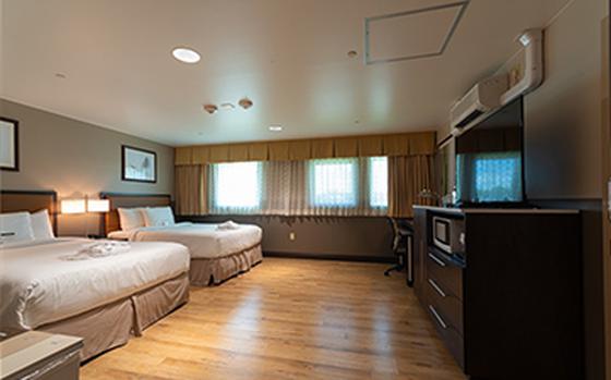 The interior of a room at Inns of the Corps (Hansen).