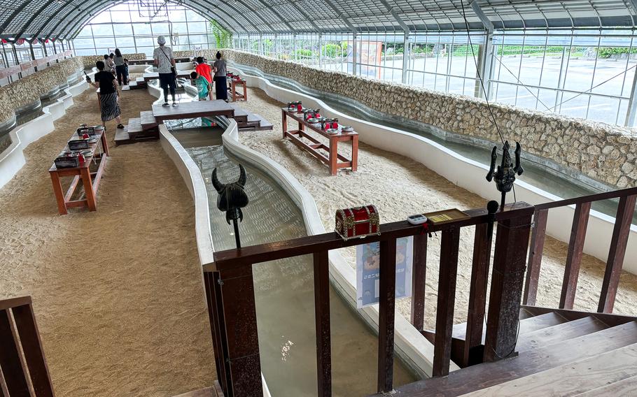 An artificial river flows in a greenhouse.