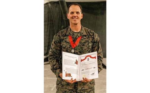 Photo Of Chief Warrant Officer 2 Austin McHalek poses for a photo.