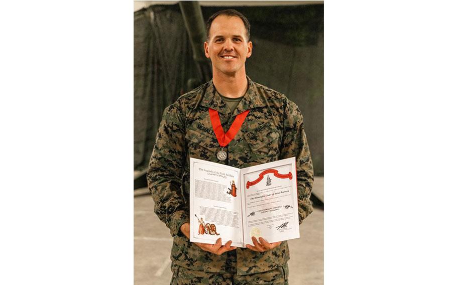 Chief Warrant Officer 2 Austin McHalek poses for a photo.