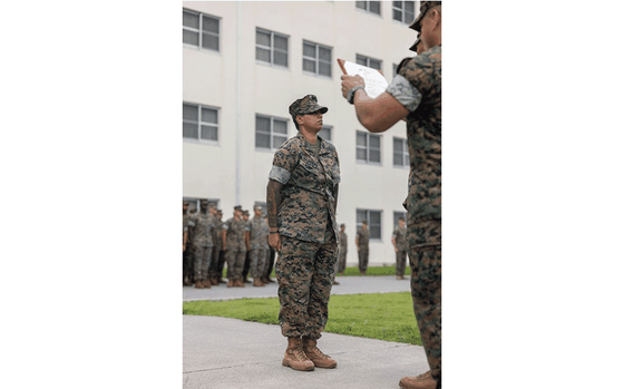 Photo Of U.S. Marine Corps Gunnery Sgt. Felicia Bangaru stands at attention during her Navy and Marine Corps Commendation Award ceremony on Camp Schwab, Okinawa, Japan, Sept. 9, 2024. The Navy and Marine Corps Commendation Medal is awarded to Marines and Sailors for meritorious service or acts of heroism and was awarded to Bangaru for her exceptional efforts in coordinating logistics support during a 4th Marines exercise. Bangaru, a native of Florida, is a supply chief with 4th Marine Regiment, 3d Marine Division.