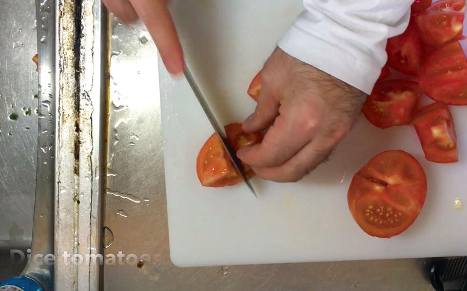 Dice tomatoes.