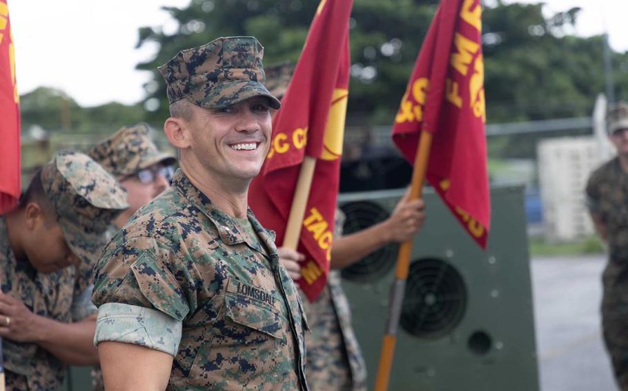 U.S. Marine Corps Lt. Col. James Lomsdale, commanding officer of the Marine Air Support Squadron 2, Marine Air Control Group 18, 1st Marine Aircraft Wing, talks to his Marines during a formation at Marine Corps Air Station Futenma, Okinawa, Japan, Aug. 1, 2025