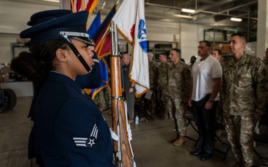 U.S. Air Force Senior Airman Nkayla Williams, 18th Wing honor guardsman, presents the colors during the national anthem at the police week closing ceremony held at Kadena Air Base, Japan, May 16, 2025. Police Week is held every year to honor the fallen law enforcement officers who gave their lives in the line of duty. 