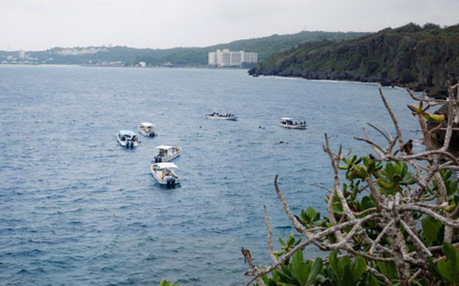 View from Cape Maeda. Some boats can be seen on the sea.