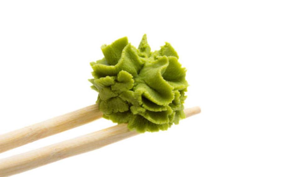 wasabi on chopsticks.