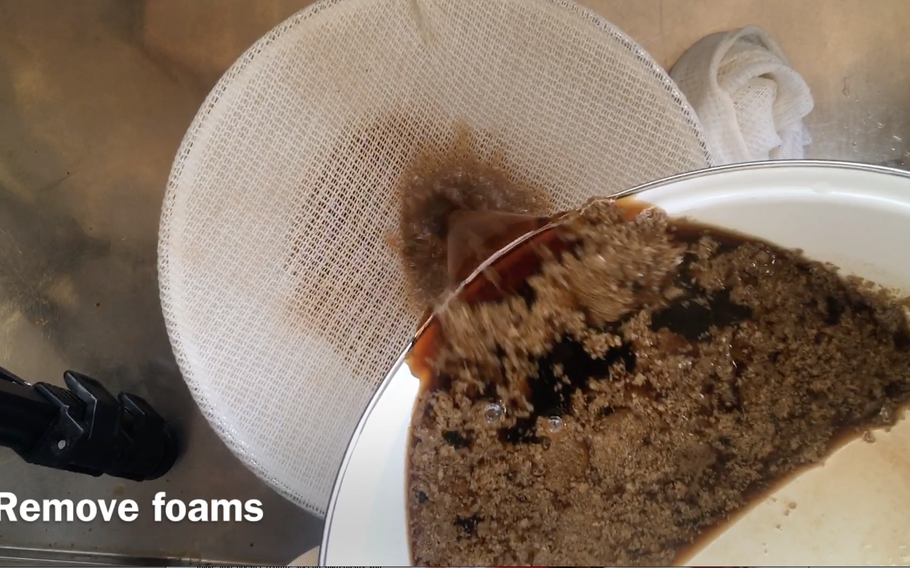 With a strainer, remove the foam that collects at the top. (If you have a larger strainer, you can carefully pour the hot mixture into a bowl instead.)
