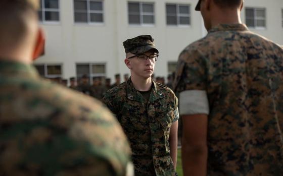 U.S. Marine Corps 1st Lt. Grover Barham III stands at attention during his Navy and Marine Corps Achievement Medal ceremony on Camp Schwab, Okinawa, Japan, Sept. 23, 2024. The Navy and Marine Corps Achievement Medal was awarded to Barham for his exceptional efforts during his time as the headquarters company executive officer. Barham, a native of Maryland, is an infantry officer with 4th Marine Regiment, 3d Marine Division.