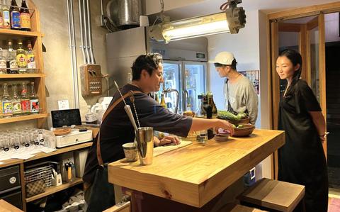 Photo Of Sakaemachi in Naha after dark: Four hours on a stool, four friends