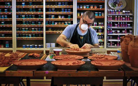 Photo Of A man is enjoying crafts.