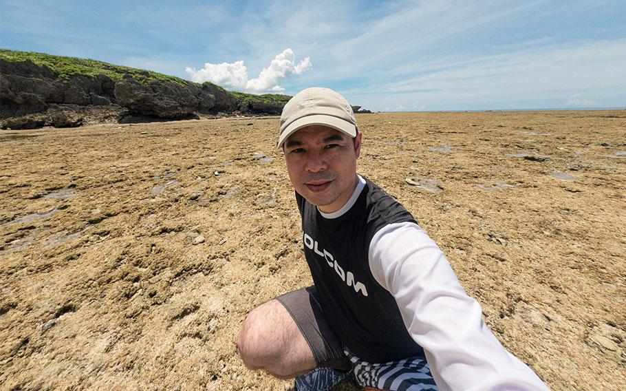 Shoji Kudaka poses for a photo.