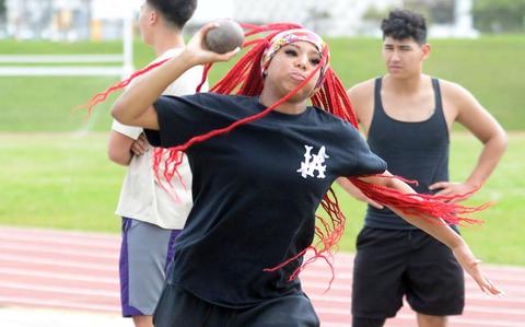 Photo Of Senior Sharday Baker is already noticeable because of her red braided hair. The Kadena sprinter is also hoping to break some Pacific sprint reccords and gain more notoriety.
