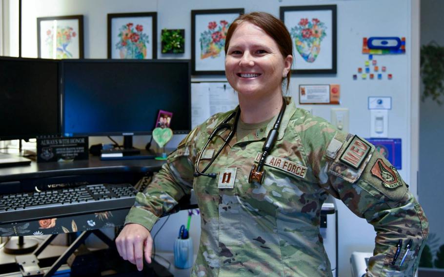 U.S. Air Force Capt. Brittany King poses in her office.