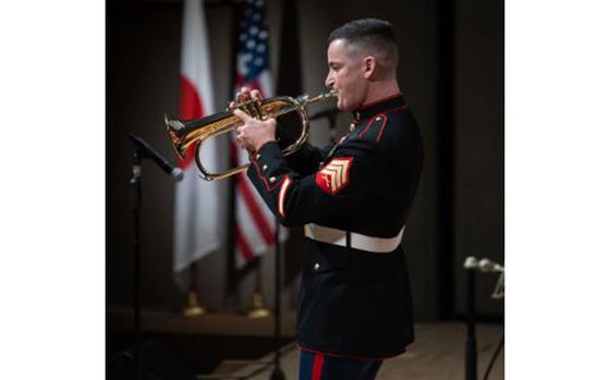 Photo Of U.S. Marine Corps Sgt. Timothy Weiss, a musician with III Marine Expeditionary Force Band performs during the US-Japan Joint Concert at the Naha Cultural Arts Theater NAHArt, Naha, Okinawa, Japan, July 27, 2024. The joint concert celebrated the long-enduring friendship and spirit of camaraderie between the III Marine Expeditionary Force Band and Southwestern Air Defense Force Band.