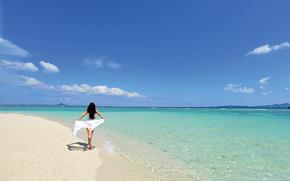 A woman on the beach.