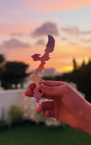 okinawa-map-shaped craft in one’s hand.