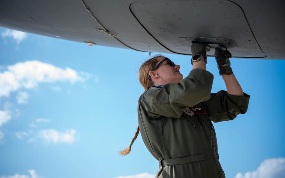 U.S. Air Force Capt. Elizabeth Luke, 909th Air Refueling Squadron pilot, conducts pre-flight checks for a U.S. Air Force KC-135 Stratotanker at Kadena Air Base, Japan, Feb. 1, 2024. Kadena conducts operations in support of the defense of Japan, as well as U.S. efforts to preserve a free and open Indo-Pacific.