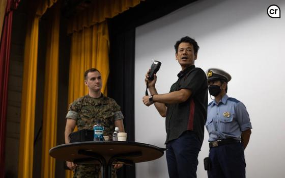 Photo Of Yosuke Nakama, chief of Traffic Safety Operations with the Okinawa Prefecture Government, demonstrates a breathalyzer test to U.S. Marines with III Marine Expeditionary Force during “The Ripple Effect” lecture discussing the dangers of driving under the influence, on Camp Courtney, Okinawa, Japan, Sept. 4, 2024.