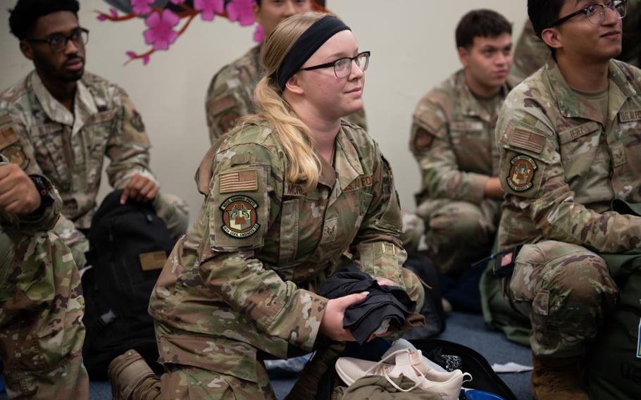 U.S. Air Force Staff Sgt. Julia Morgan, 18th Civil Engineer Squadron structures craftsman, takes accountability of her readiness items as part of a “bag drag”, during a routine readiness exercise at Kadena Air Base, Japan.