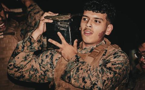 Photo Of U.S. Marine Corps Lance Cpl. Emiliano Hernandeztorres, a finance technician with Disbursing Detachment, Combat Logistics Regiment 37, 3rd Marine Logistics Group, carries an ammo can during a resupply run on Camp Foster, Okinawa, Japan.