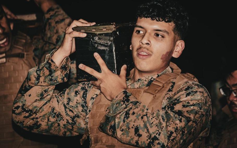 U.S. Marine Corps Lance Cpl. Emiliano Hernandeztorres, a finance technician with Disbursing Detachment, Combat Logistics Regiment 37, 3rd Marine Logistics Group, carries an ammo can during a resupply run on Camp Foster, Okinawa.