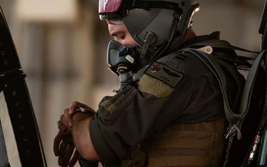 U.S. Air Force Capt. Ross Kohler, 67th Fighter Squadron F-15C Eagle pilot, monitors the time prior to engine start during Exercise Southern Beach at Kadena Air Base, Japan, Oct. 28, 2021. This was the first time since the inception of Southern Beach where the majority of the mission sets and a Japan-U.S. training program were conducted during night hours. (U.S. Air Force photo by Senior Airman Jessi Monte)