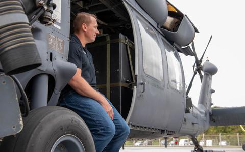 Photo Of Medal of Honor recipient Dakota Meyer sits in an HH-60G Pave Hawk at Kadena Air Base, Japan, Feb. 28, 2024. During his visit Meyer gave advice to service members across Okinawa; from Kadena Air Base to United States Marine Corps Camps Foster and Kinser.