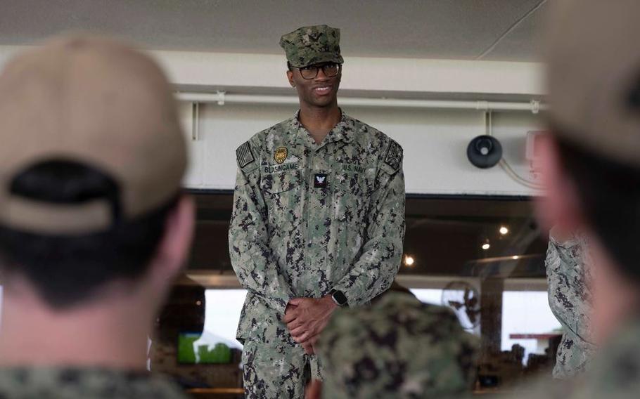 Master-At-Arms 3rd Class Christian Blasingame, from Houston, assigned to Commander, Fleet Activities Okinawa’s (CFAO) security department, gives remarks after being selected as a CFAO Sailor of the Quarter during an all hands call on White Beach Naval Facility.