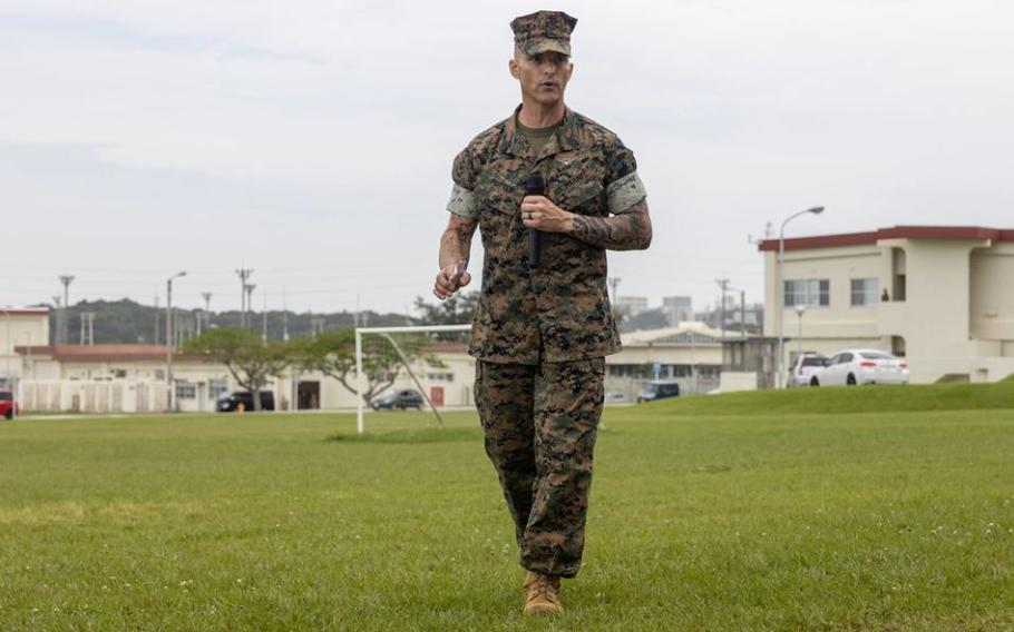 U.S. Marine Corps Sgt. Maj. David Potter, off going sergeant major of Combat Logistics Battalion 12 (CLB-12), Combat Logistics Regiment 3, addresses the audience after being relieved of his duties at Camp Foster.