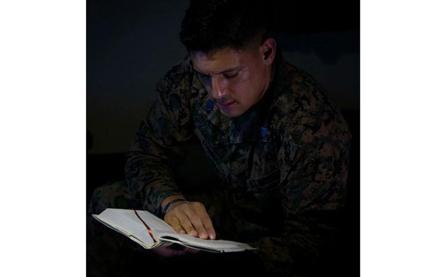 U.S. Marine Corps Sgt. Avery Luengo, the platoon sergeant for G-6 Customer Service Branch, reads his book on Camp Foster, Okinawa, Japan, Feb. 12, 2020. Luengo remains proactive with his Marines and his own duties by being a force multiplier and exceeding the standard of a noncommissioned officer by earning several awards and certifications through various demanding billets. Luengo is a native of Reynosa, Mexico, and McAllen, Texas. (U.S. Marine Corps photo by Cpl. Karis Mattingly)