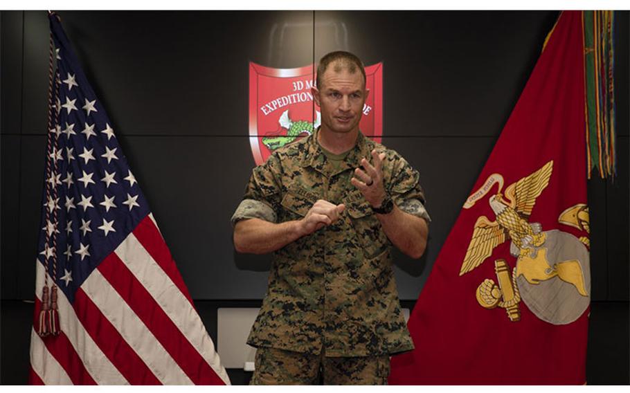 Brig. Gen. Kyle B. Ellison, incoming commanding general, 3D Marine Expeditionary Brigade (MEB), delivers comments during a change of command ceremony at Camp Courtney, July 10, 2020. Ellison took command of the MEB from Maj. Gen. Paul J. Rock. Ellison's previous assignment was the Director of Expeditionary Warfare School. (U.S. Marine Corps photo by Lance Cpl. Hannah Hall)