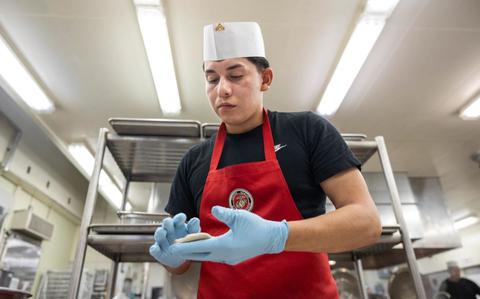 Photo Of U.S. Marine Corps Cpl. Mauricio Nava Quintana, a food service specialist with Combat Logistics Regiment 37, 3rd Marine Logistics Group, prepares batter during the Chef of the Quarter competition at Camp Kinser, Okinawa, Japan, Feb. 8, 2024.