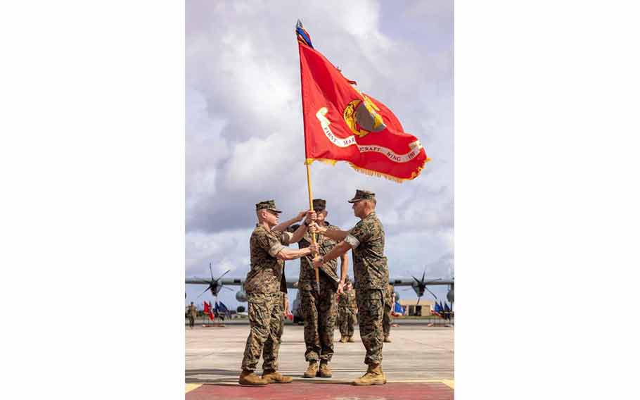 U.S. Marine Corps Maj. Gen. Eric E. Austin, right, the outgoing commanding general, relinquishes command of 1st Marine Aircraft Wing to Maj. Gen. Marcus B. Annibale during a change of command ceremony at Marine Corps Air Station Futenma, Okinawa, Japan, July 12, 2024. 