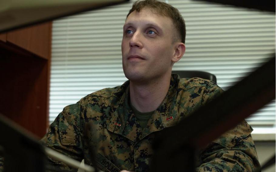 U.S. Marine Corps Chief Warrant Officer 3 Matthew Holmberg, a financial management resource officer with III Marine Expeditionary Force, poses for a photo after being awarded the Financial Management Resource Officer CWO of the Year for the inaugural 2023 Marine Corps Financial Management Awards Program at Camp Courtney, Okinawa, Japan, Feb. 7, 2024. To be awarded the Financial Management Resource Officer CWO of the Year, a Marine should demonstrate financial management initiative, financial management systems improvement, and embrace and demonstrate innovation. Financial management initiatives include consistent timely and accurate payments, training which directly enhanced financial management, creating financial policy, and improving audit readiness. A Marine should also contribute to financial management systems improvement by embracing and demonstrating innovation. Holmberg is a native of Washington.