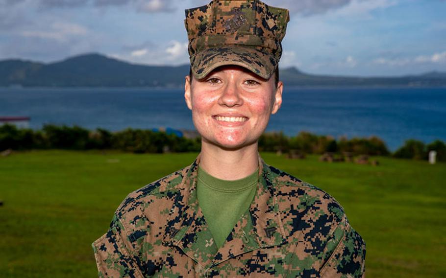 U.S. Marine Corps Cpl. Madison Schoening an operations assistant with the Reserve Affairs Branch, III Marine Expiditionary Force, poses for a photo at Camp Courtney, Okinawa, Japan, May 21, 2021. Schoening was meritoriously promoted to corporal on March 2, 2021, for winning a promotion board with 4th Marine Division. (U.S. Marine Corps photo by Lance Cpl. Zachary Sarvey)