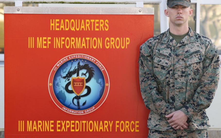 U.S. Marine Corps Captain Brandon Crowder, a financial management officer with III Marine Expeditionary Force Information Group, poses for a photo on Camp Hansen, Okinawa, Japan, Jan. 31, 2024. Captain Crowder, is the first officer to be recognized as the financial management officer of the year.