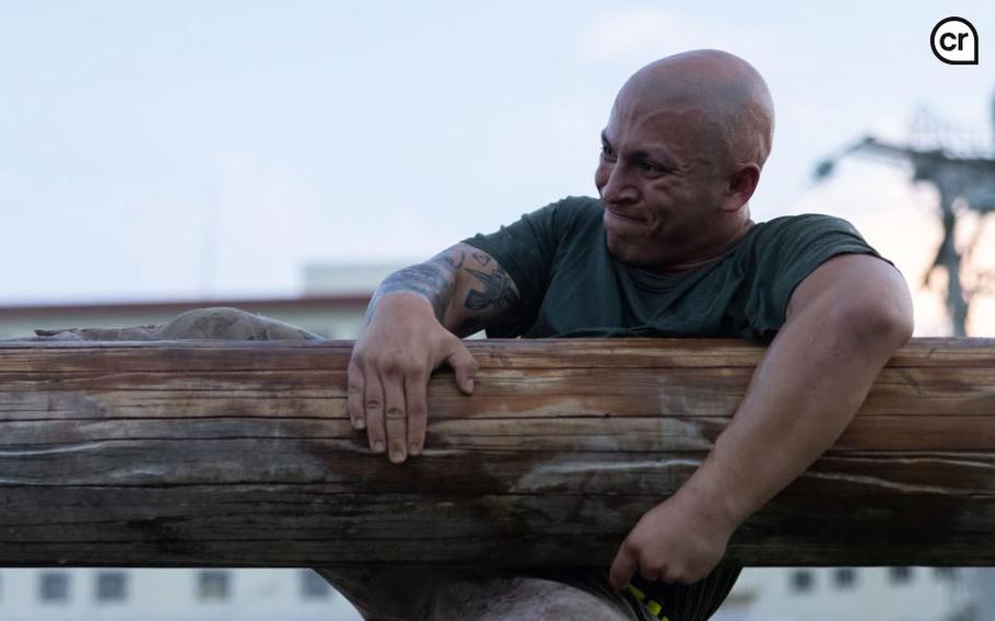 U.S. Marine Corps Lance Cpl. Kevin Cervantes Manriques vaults over an obstacle as a part of the endurance course during a squad competition at Camp Schwab, Okinawa, Japan, Aug. 30, 2024.