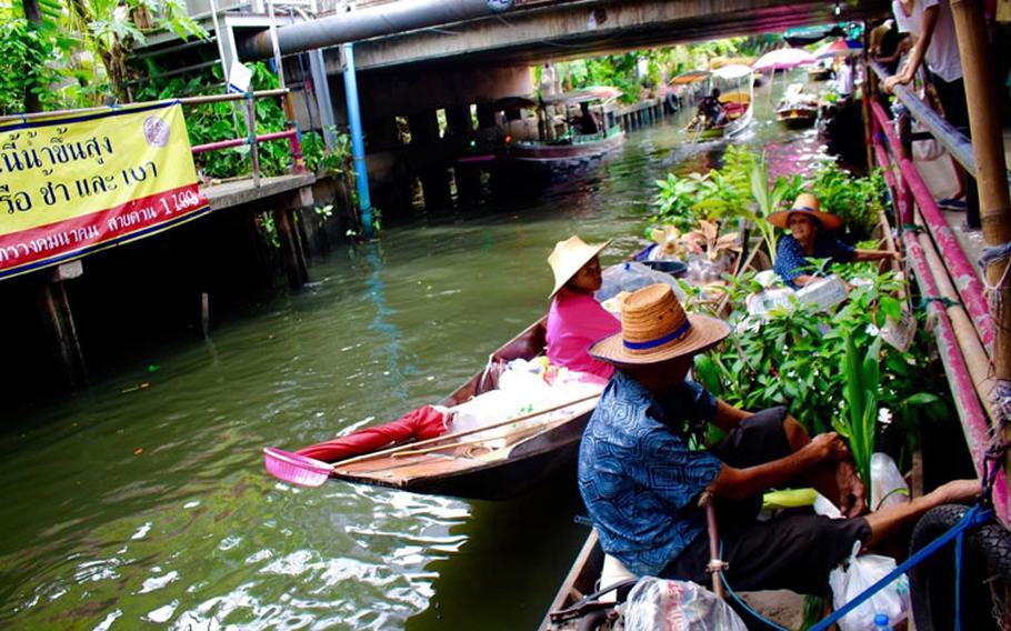 Vendors on boats at Khlong Lat Mayom in the southwestern part of the Bangkok.