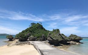 A road to a small island can be seen.